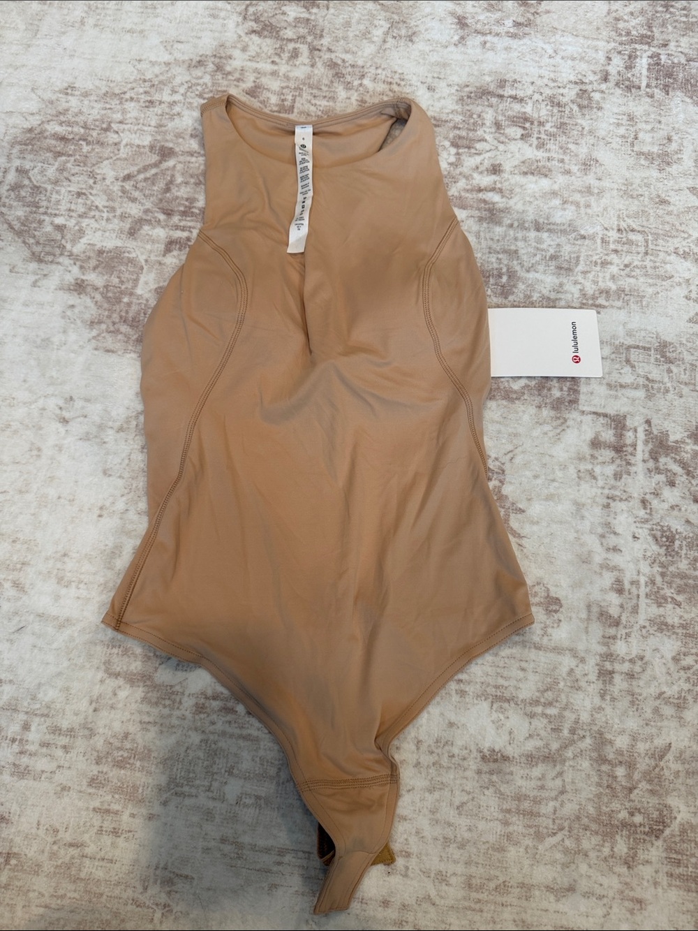 Lululemon Women’s One-Piece Bodysuit in Beige